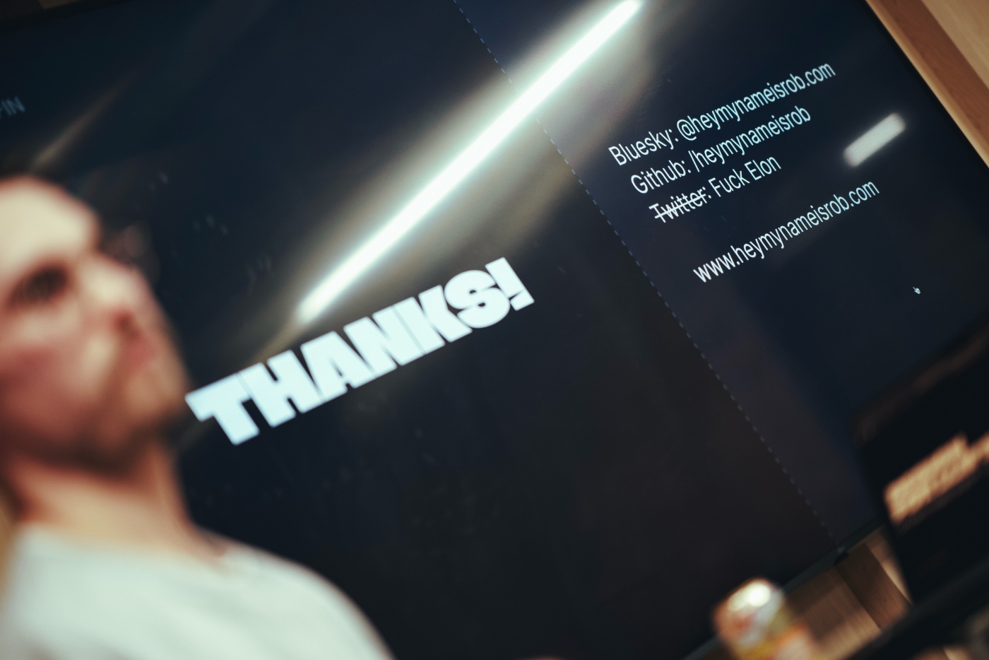 NN1 Dev Club picture of a slide that says &ldquo;Fuck Elon&rdquo;